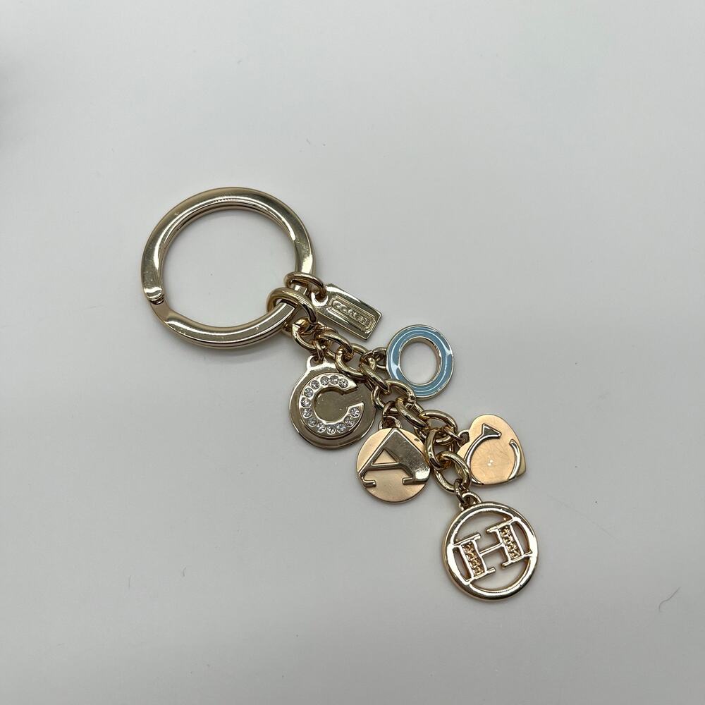 COACH Charm Keychain Logo Lettering, Gold - Picture 7 of 8